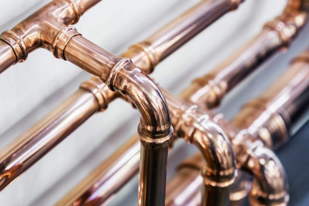 copper-pipes-fittings-carrying-out-plumbing-work