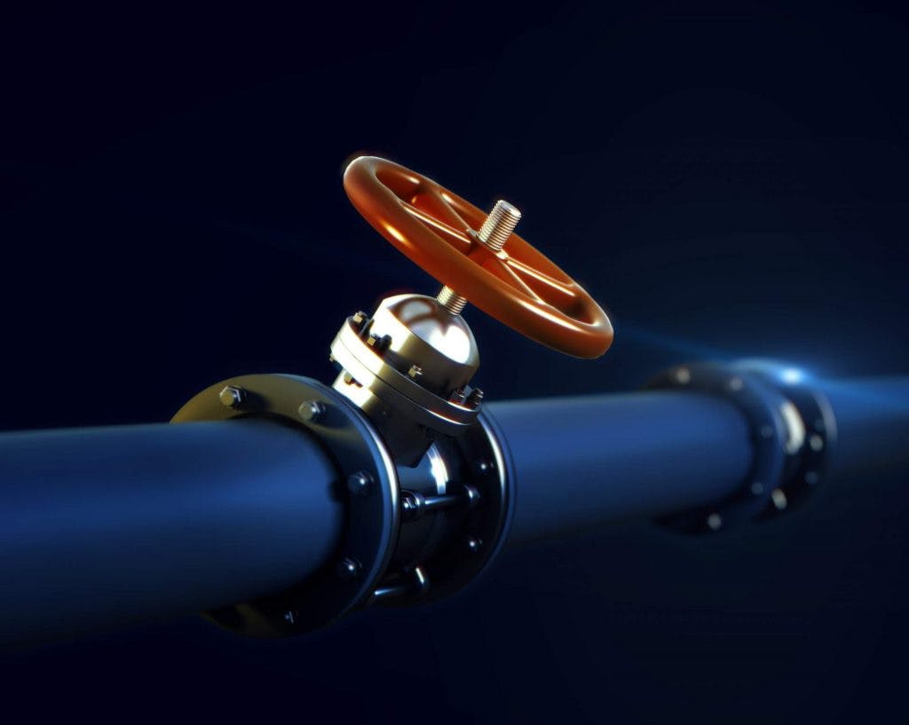 metal-pipeline-with-valve-red-handwheel